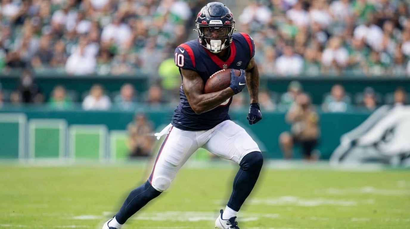 Professional football player running with the ball during a game