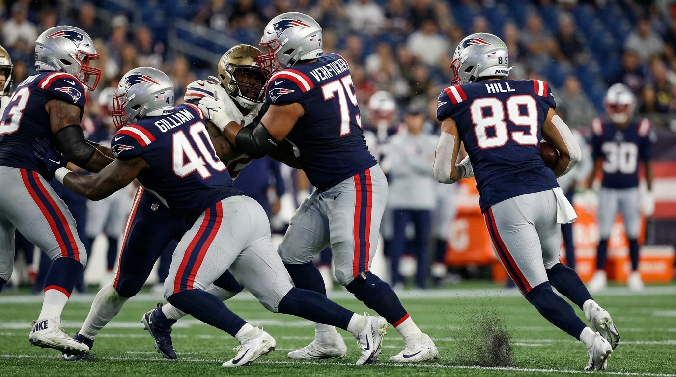 Action shot of Reggie Gilliam blocking, Alijah Vera-Tucker engaging a defender, and Julian Hill running through a gap during a Patriots game